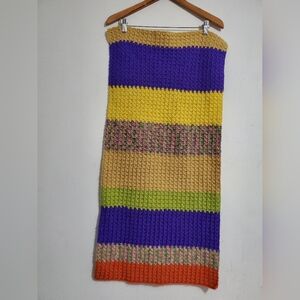 Handmade, multi-colored crochet lap  blanket.